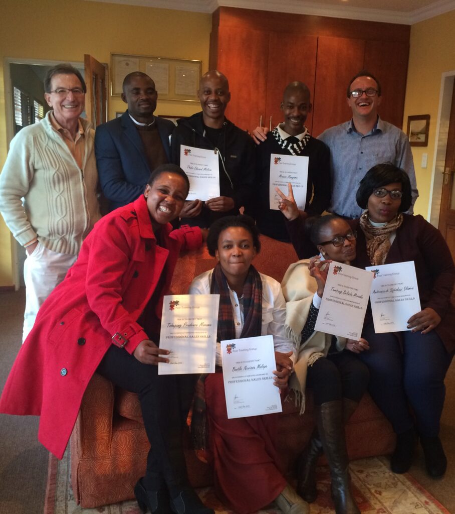 Clive Price with happy sales training delegates