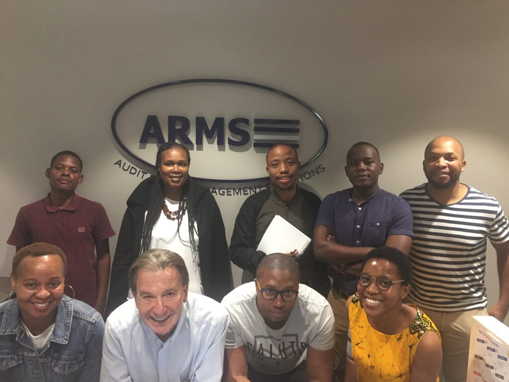 Clive Price with happy sales training delegates